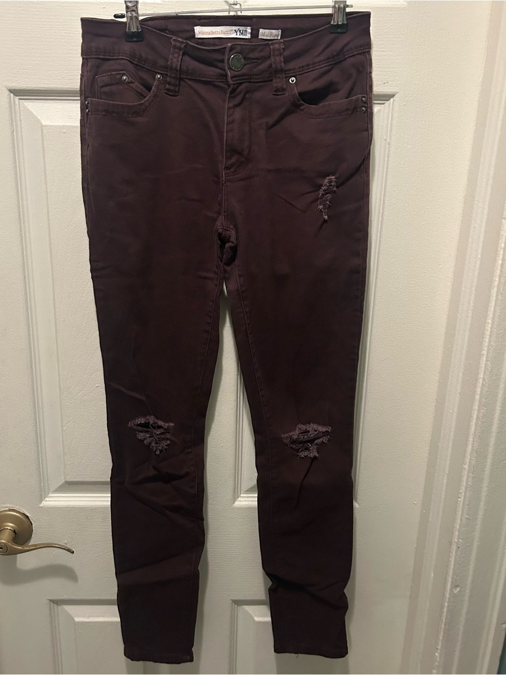 Burgundy mid rise distressed jeans